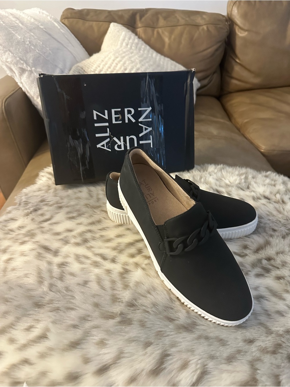 Naturalizer Black Slip-On Sneakers with White Sole and Chain Accent